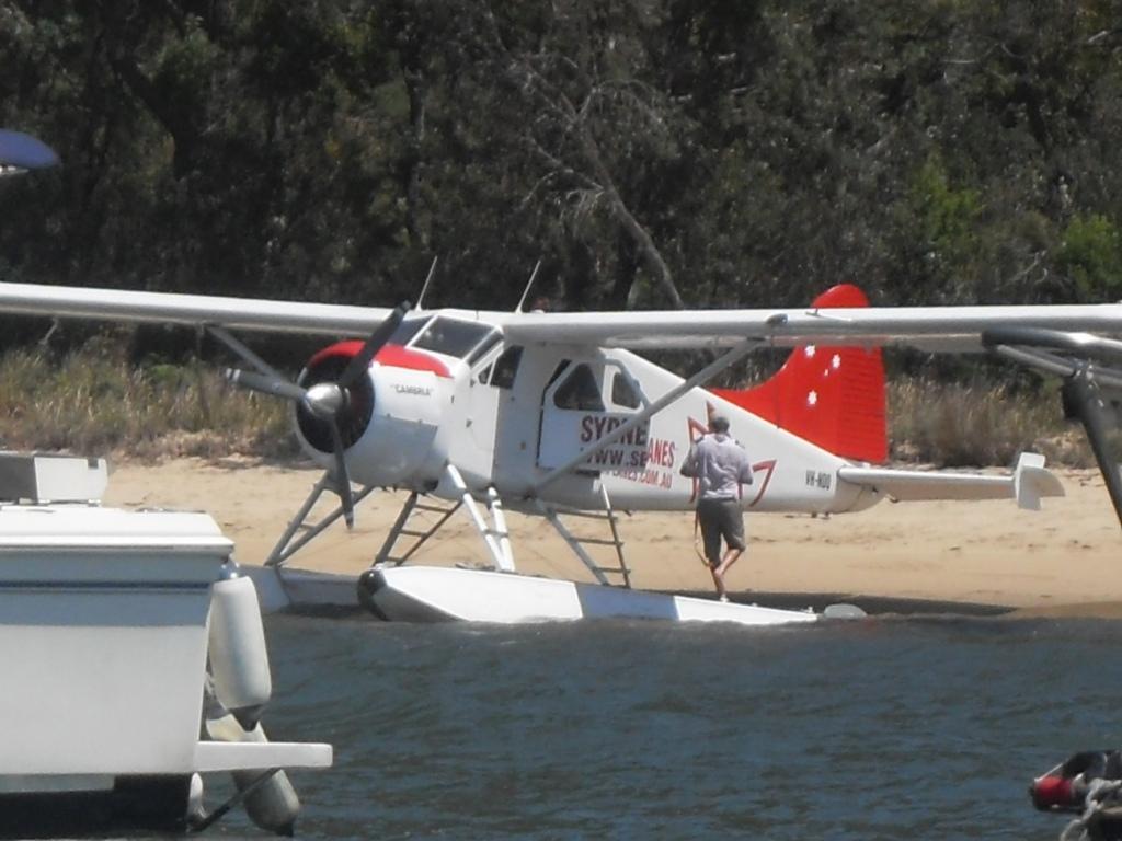 Seaplane pilot after unplanned dip.jpg