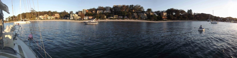 Nelson Bay,Shaun rowing towards Seaka at our first anchorage in Port stephens.